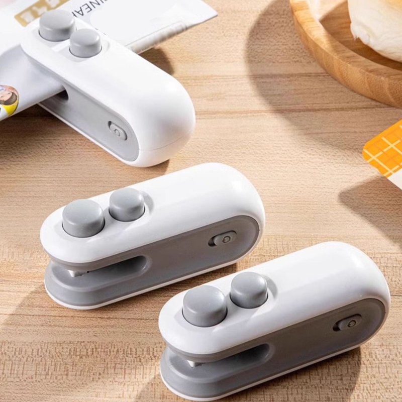 🛒 เครื่องซีลสูญญากาศขนาดเล็กแบบพกพาในครัวเรือน Magnetic Hand Pressure Heat Sealer Snack Bag Sealing Clip