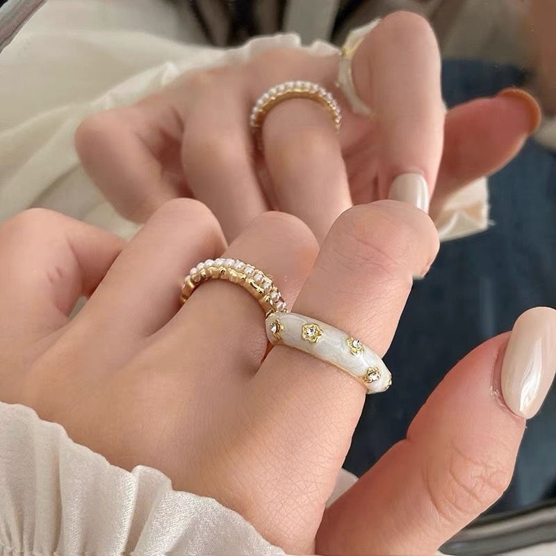 เกาหลีแฟชั่นมุกไรน์สโตนแหวนดอกไม้หญิงสีทองอินของขวัญวันเกิดนักเรียน
