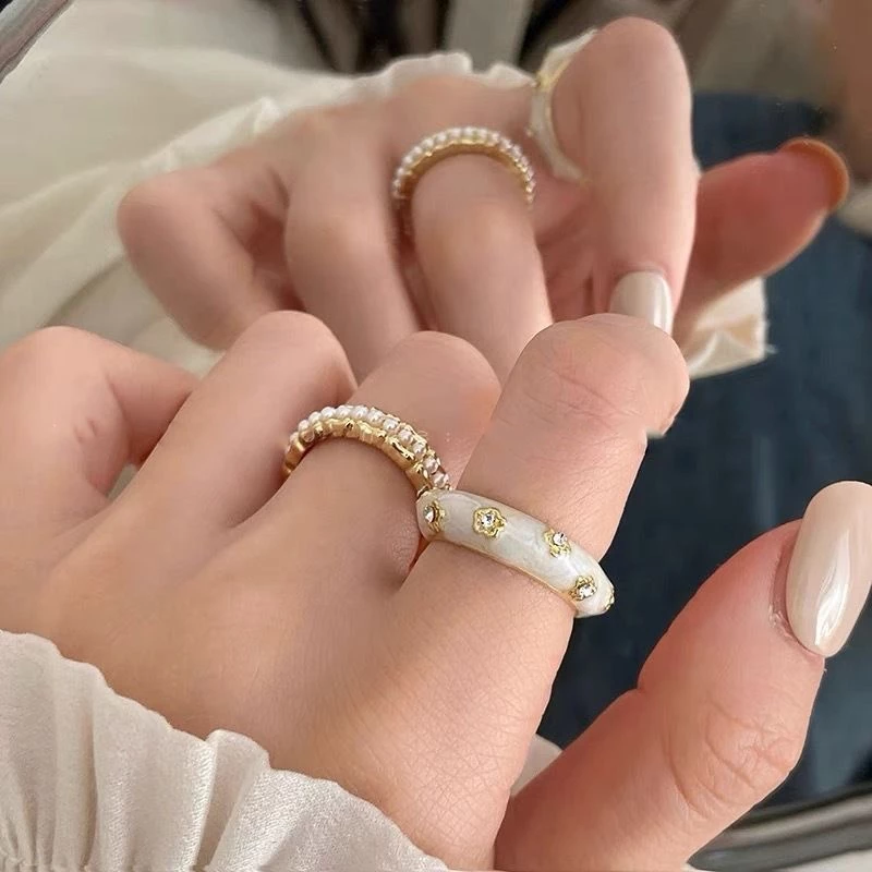 เกาหลีแฟชั่นมุกไรน์สโตนแหวนดอกไม้หญิงสีทองอินของขวัญวันเกิดนักเรียน