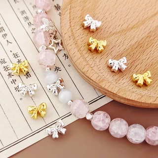 10 ชิ้น diy สร้อยข้อมือลูกปัดอุปกรณ์เสริมโลหะผสมโบว์ spacer ลูกปัด