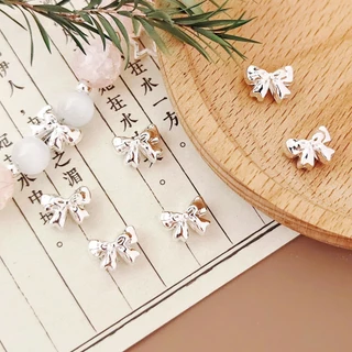 10 ชิ้น diy สร้อยข้อมือลูกปัดอุปกรณ์เสริมโลหะผสมโบว์ spacer ลูกปัด