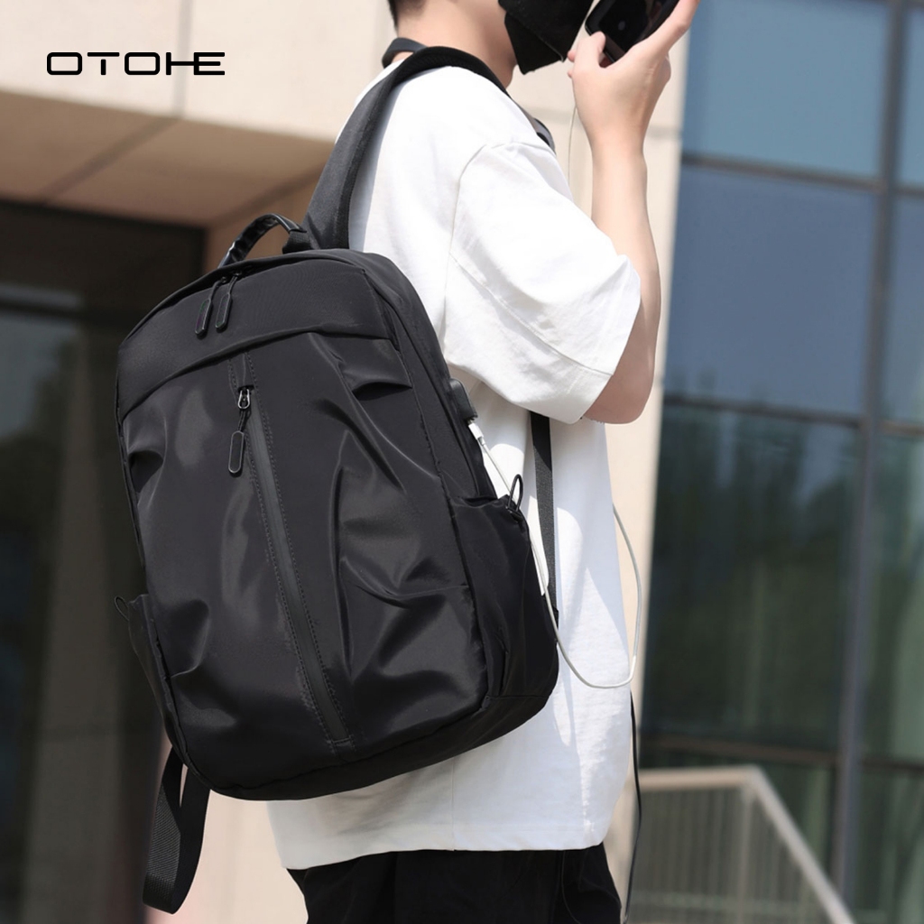 OTOHE กระเป๋าเป้สะพายหลังผู้ชาย USB ชาร์จแล็ปท็อปกระเป๋าเป้สะพายหลัง Casual Travel กระเป๋านักเรียน Dacron กระเป๋าเป้สะพายหลังสีทึบ