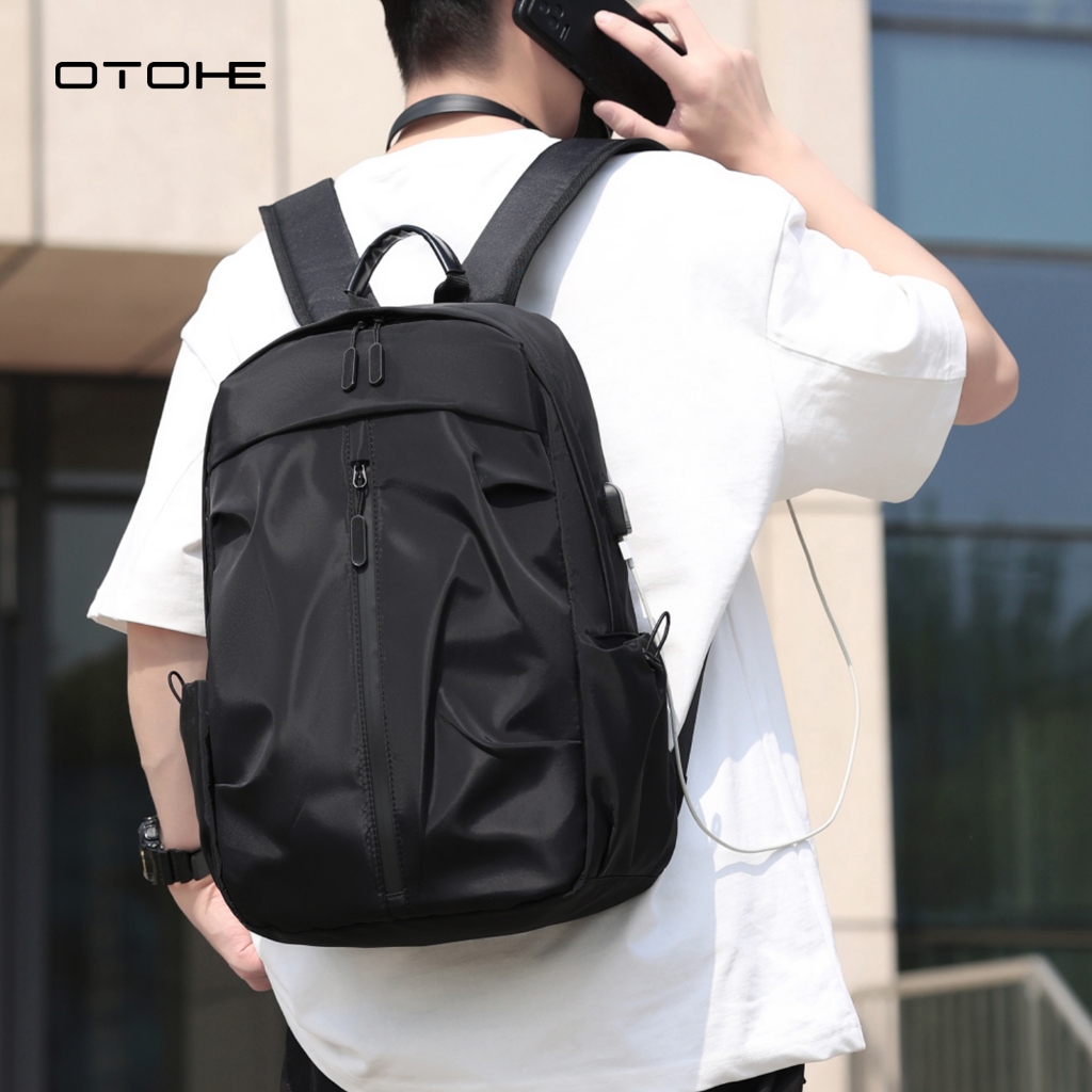 OTOHE กระเป๋าเป้สะพายหลังผู้ชาย USB ชาร์จแล็ปท็อปกระเป๋าเป้สะพายหลัง Casual Travel กระเป๋านักเรียน Dacron กระเป๋าเป้สะพายหลังสีทึบ