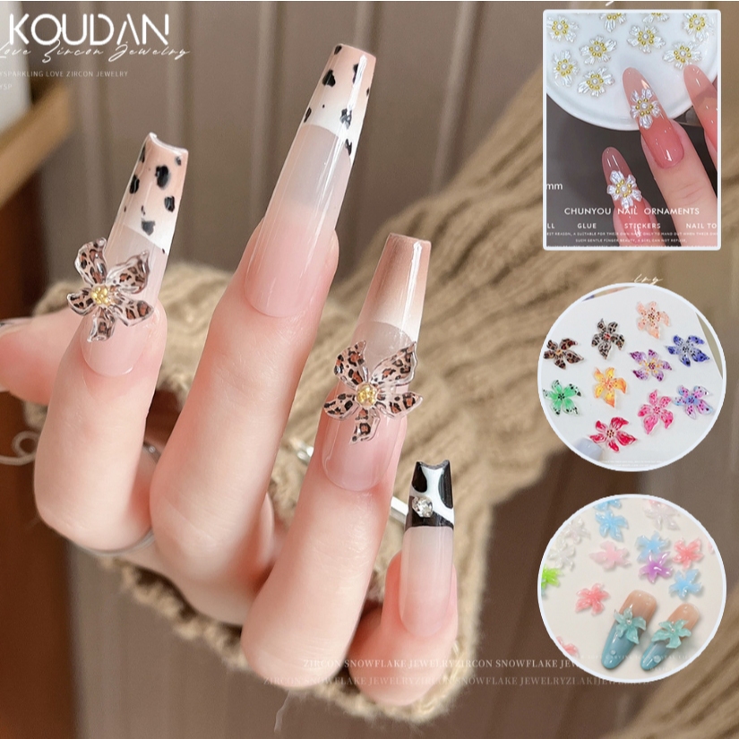 ตกแต่งเล็บสติกเกอร์เล็บ DIY ดอกไม้ที่มีสีสันเสือดาวพิมพ์นุ่มแกะสลักคริสตัลน้ําแข็ง Lily Pearl White Golden Ball KOULDAN