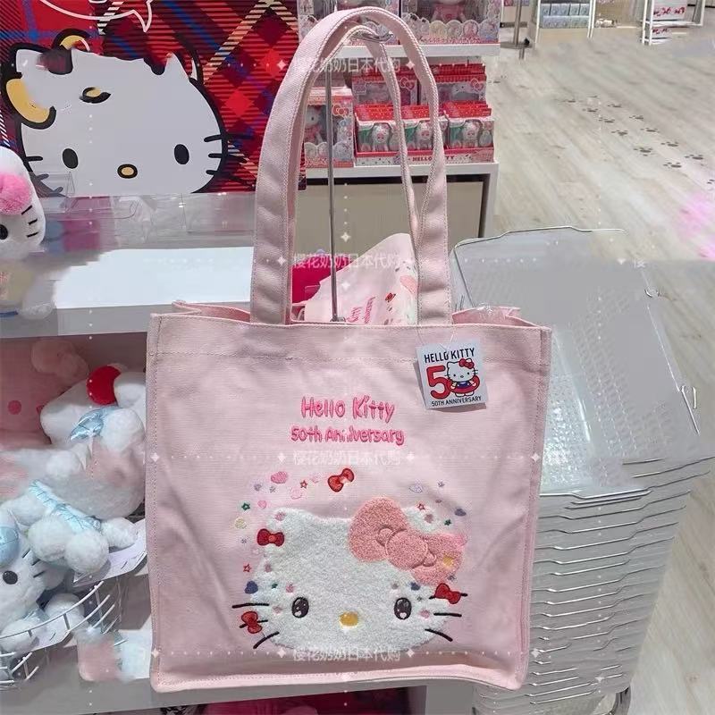 กระเป๋าโท้ทคิตตี้น่ารักสำหรับการเดินทางและใช้ในวันธรรมดาดีไซน์หวานๆ