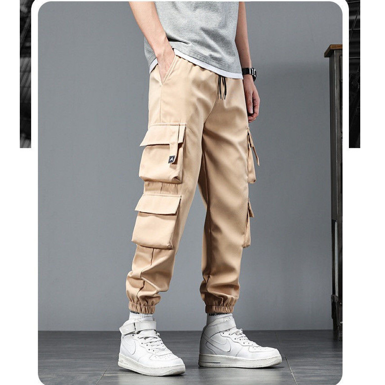 【จัดส่งจากกรุงเทพฯ】กางเกงขายาวชาย หลายกระเป๋า เชือกผูกเอว ทรงหลวม ชุดเอี๊ยมสไตล์เกาหลี ขนาด: M-5XL - รูปที่ 5