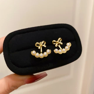 [Jewbeauty]โบว์ต่างหูมุกแฟชั่นย้อนยุคหมุดที่ละเอียดอ่อนแสงหรูหราอุปกรณ์เสริมความรู้สึกสูง
