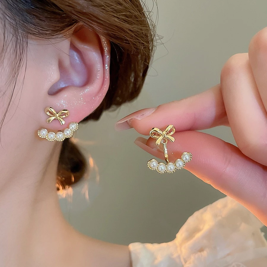[Jewbeauty]โบว์ต่างหูมุกแฟชั่นย้อนยุคหมุดที่ละเอียดอ่อนแสงหรูหราอุปกรณ์เสริมความรู้สึกสูง