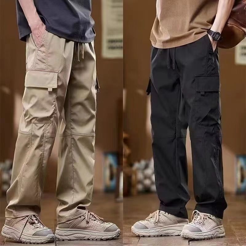 กางเกงคาร์โก้ผู้ชาย ทรงหลวม ทรงตรง มีหลายกระเป๋า เอวยางยืด กางเกงผู้ชาย คล่องแคล่วและสบายสบาย M-4XL