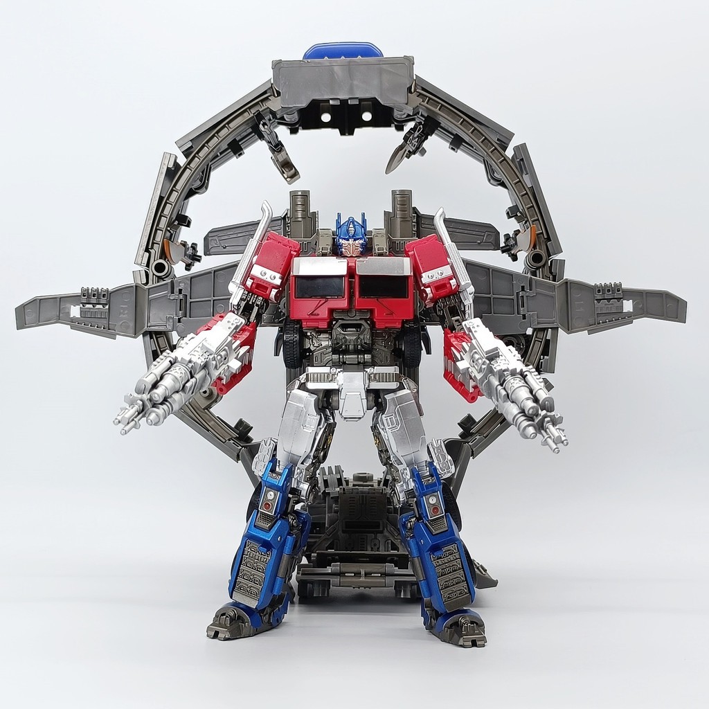 โมเดลหุ่นยนต์แปลงร่าง Optimus Prime Budweiser Saixing Commander Hornet โมเดลของเล่นหุ่นยนต์เครื่องบิน