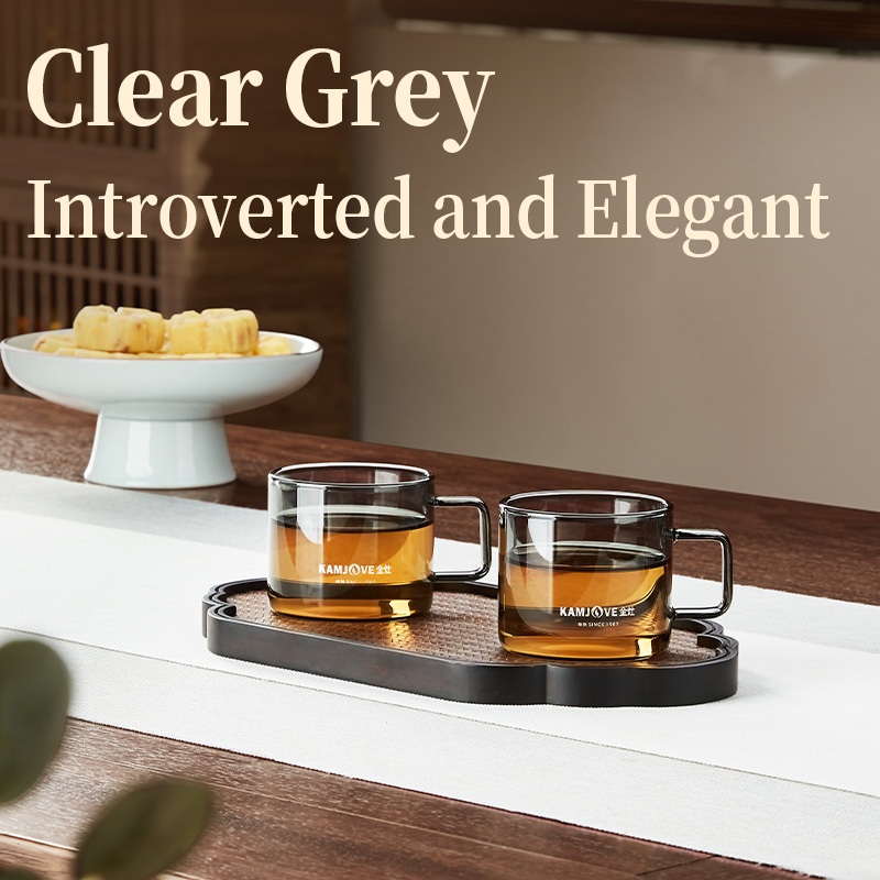 Kamjove 2025 ถ้วยน้ําแก้วทนความร้อนสไตล์ใหม่สีเทาโปร่งใสและคลาสสิกถ้วยชาโปร่งใสพร้อมที่จับ - รูปที่ 2