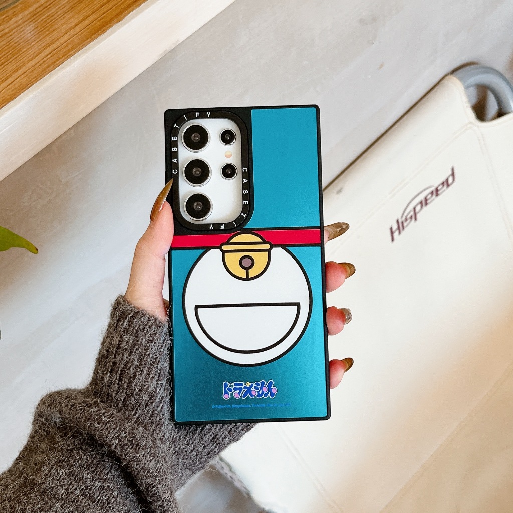 กระจก การ์ตูนน่ารัก โดราเอมอน เคส Samsung Galaxy S25 Ultra S25 Plus S24 Ultra S24 Plus S23 Ultra S23 Plus Case เคสโทรศัพท์ใหม่ ตัวอักษรภาษาอังกฤษด้านข้าง แผ่นหลังอะคริลิค ขอบซิลิโคนอ่อนขอบป้องกันการตก เคสมือถือซัมซุง