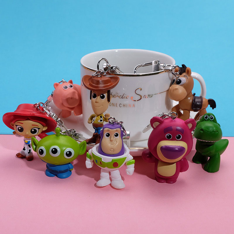 8 รูปแบบ 5 ซม.Toy Story จี้พวงกุญแจเด็กชายและเด็กหญิงกระเป๋าเป้สะพายหลัง Decor ของขวัญรับปริญญา Buzz Woody Alien แขวนเครื่องประดับสําหรับกระเป๋ารถพวงกุญแจ