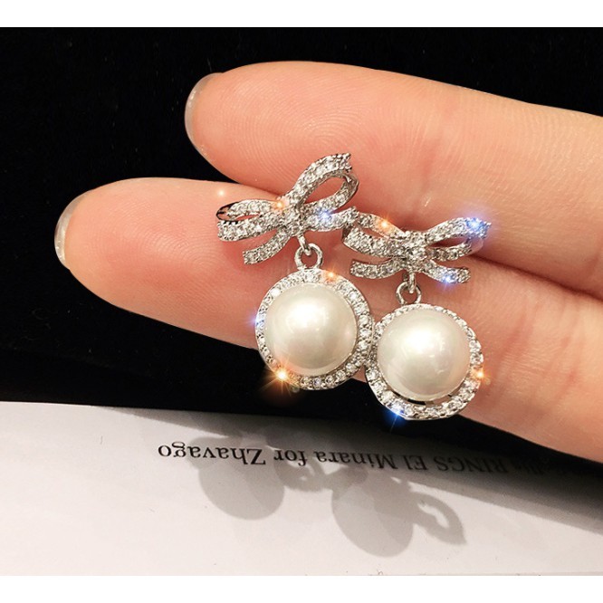 ต่างหูมุกผู้หญิง 2025 สไตล์ใหม่อินเทรนด์การออกแบบเฉพาะแสงหรูหราความรู้สึกระดับไฮเอนด์ - รูปที่ 4