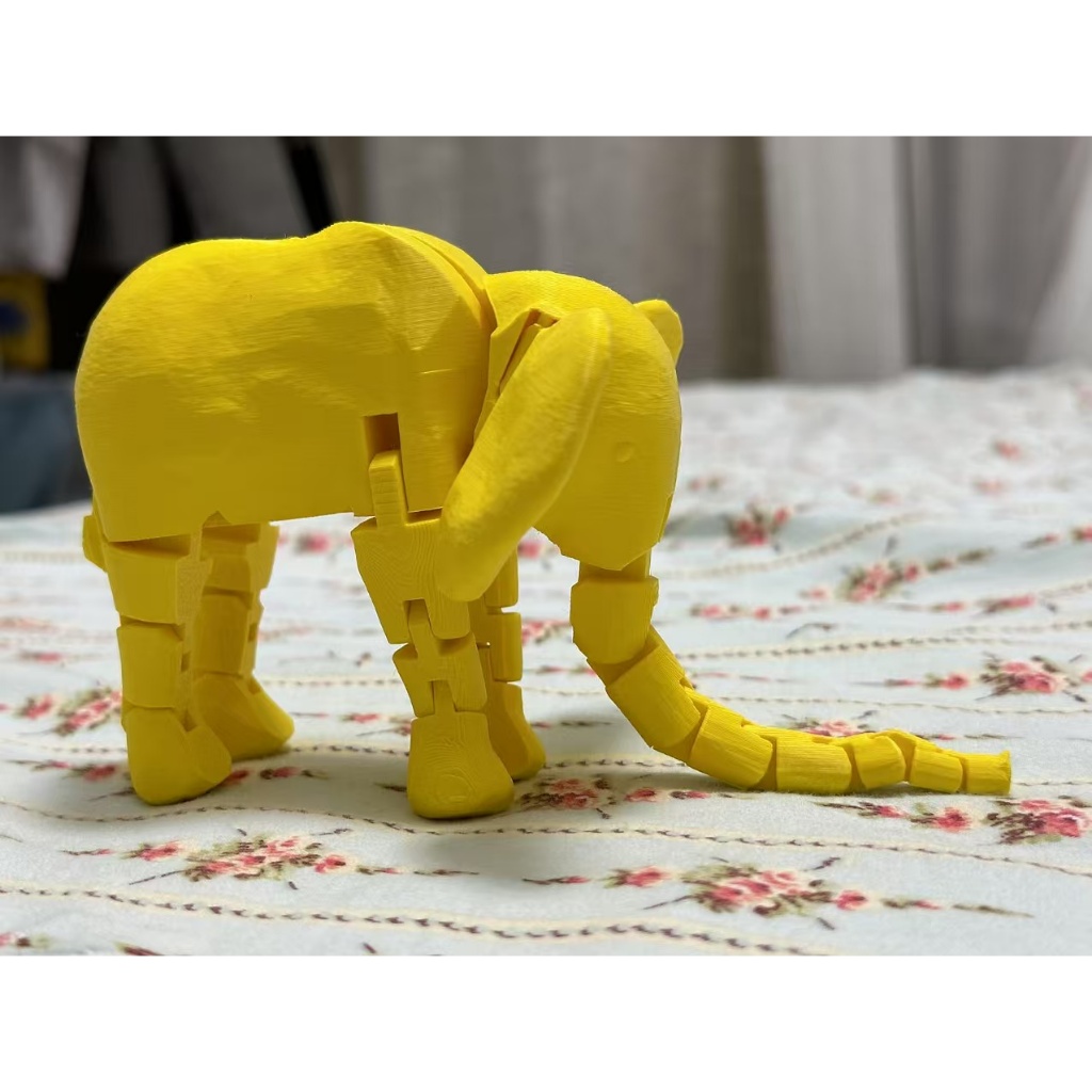 "ช้างพิมพ์ 3D Articulated – ด้านหลังและขาได้สําหรับการเล่นที่สร้างสรรค์หรือตกแต่งโต๊ะ!
