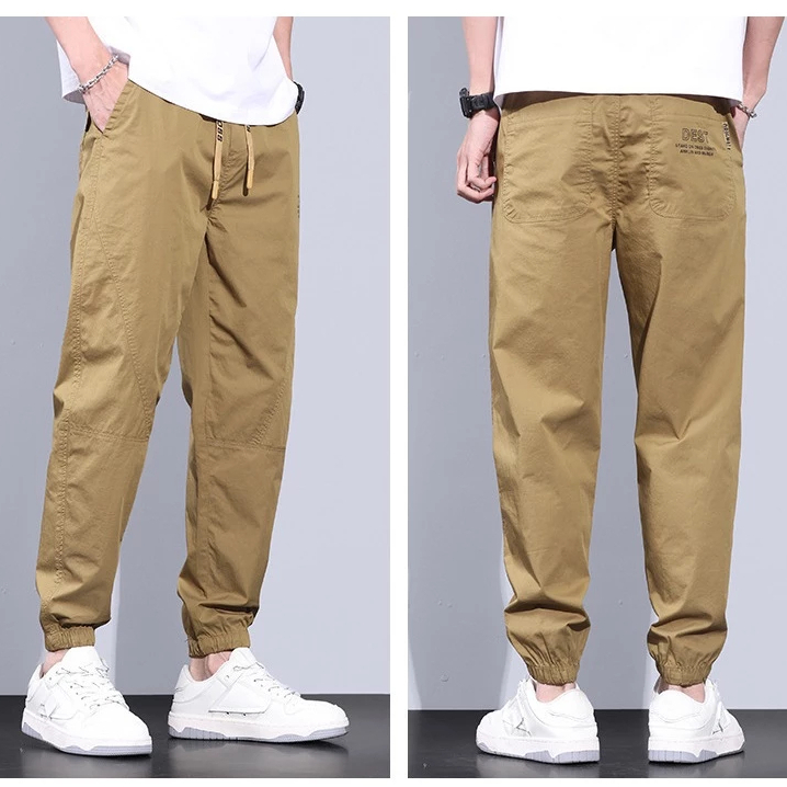 Fashion กางเกงขายาวผู้ชาย แฟชั่น กางเกงเอวยางยืด ขาจ้ำ ทรงสวยมีกระเป๋าข้าง เนื้อ
