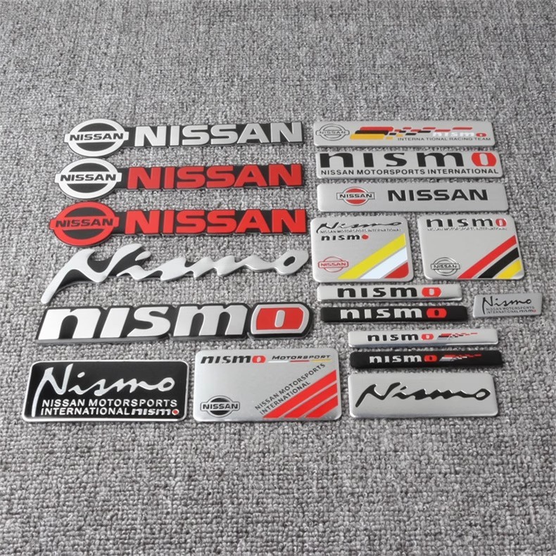 เหมาะสําหรับ NISSAN NISSAN Kicks e-Power ใหม่ Qijun Sunshine Almera Sylphy Tuda EasyCard Teana ดัดแปลง nismo ตกแต่งป้ายรถ