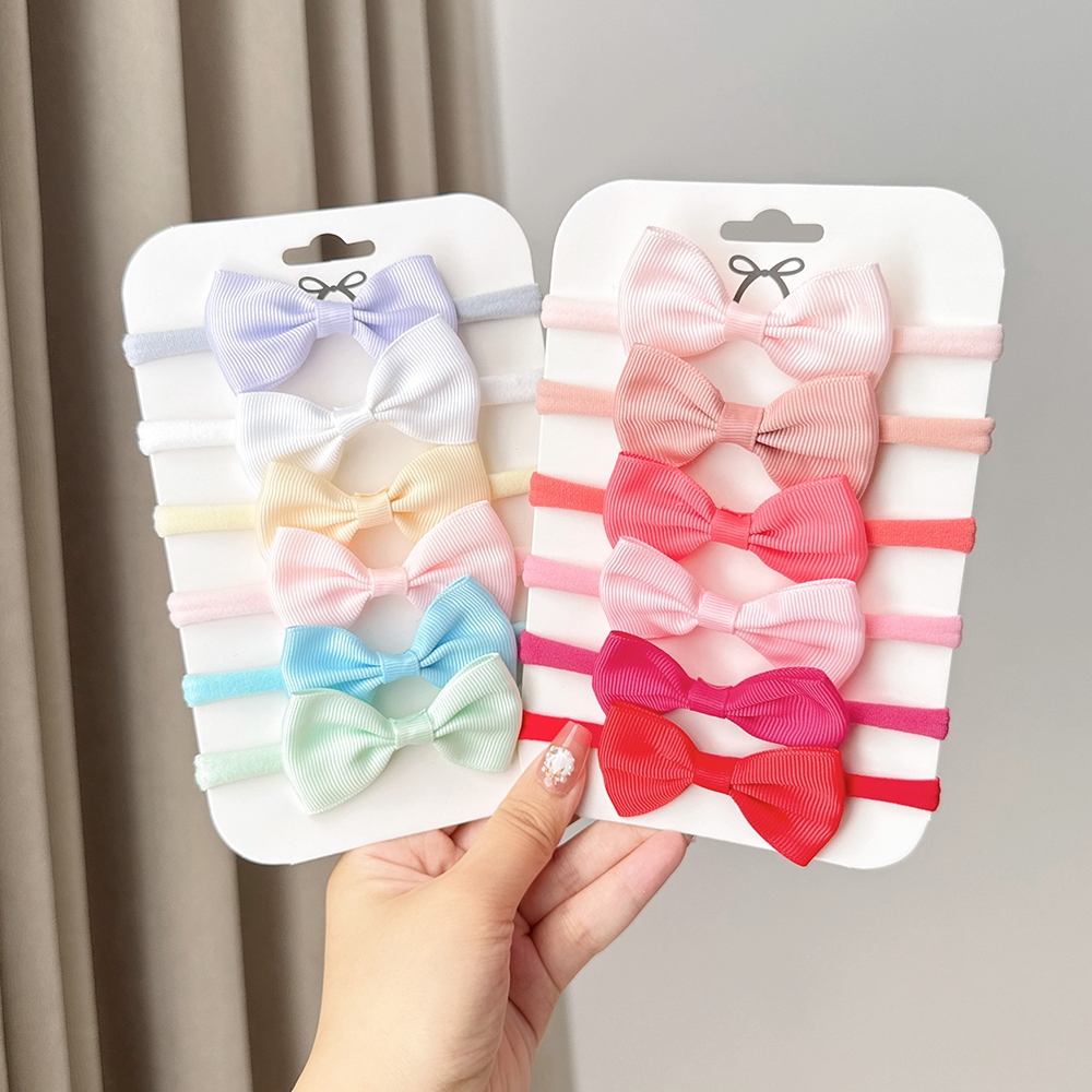 6 ชิ้น/เซ็ตสาวใหม่สีทึบ Bowknot แถบคาดศีรษะเด็กริบบิ้น Headwear แฟชั่นเด็กอุปกรณ์เสริมผม DIY