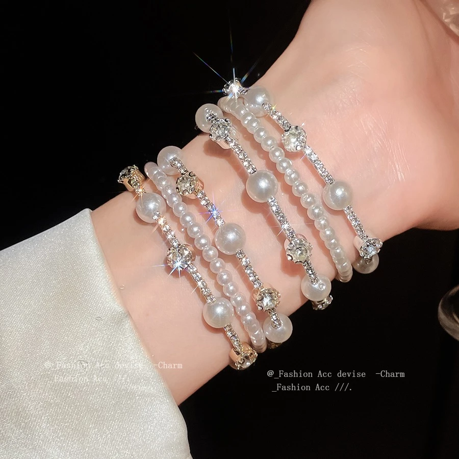 ชุดมุกเพชรหลายชั้นรอบสร้อยข้อมือฝรั่งเศสย้อนยุคอารมณ์สร้อยข้อมือแสงหรูหราอาวุโสความรู้สึกแฟชั่นเครื่องประดับมือหญิงขายส่ง