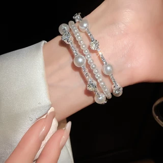 ชุดมุกเพชรหลายชั้นรอบสร้อยข้อมือฝรั่งเศสย้อนยุคอารมณ์สร้อยข้อมือแสงหรูหราอาวุโสความรู้สึกแฟชั่นเครื่องประดับมือหญิงขายส่ง
