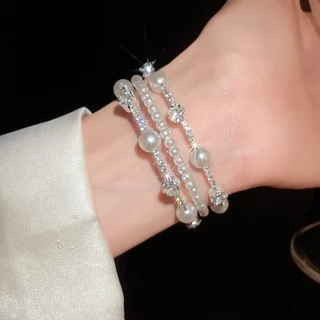 ชุดมุกเพชรหลายชั้นรอบสร้อยข้อมือฝรั่งเศสย้อนยุคอารมณ์สร้อยข้อมือแสงหรูหราอาวุโสความรู้สึกแฟชั่นเครื่องประดับมือหญิงขายส่ง