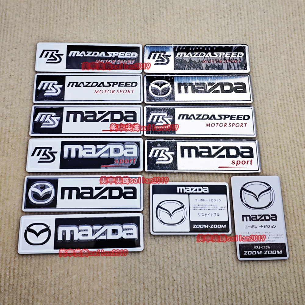 เหมาะสําหรับ Mazda Atez CX-4 Ruiyi CX-5 Axela CX-7 CX-30 CX-50 โลโก้ภายในรถตกแต่งภายนอกสติกเกอร์ Body Fender ด้านหลังการปรับเปลี่ยนป้าย