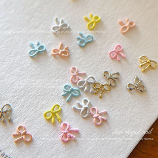 Rou Bao 20 ชิ้นเล็บ Mini Alloy Bow ครีมที่มีสีสัน Hollow Girly เล็บ Art DIY Charms ตกแต่ง