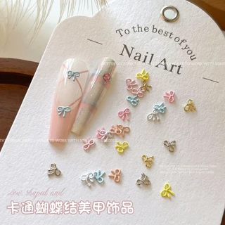 Rou Bao 20 ชิ้นเล็บ Mini Alloy Bow ครีมที่มีสีสัน Hollow Girly เล็บ Art DIY Charms ตกแต่ง