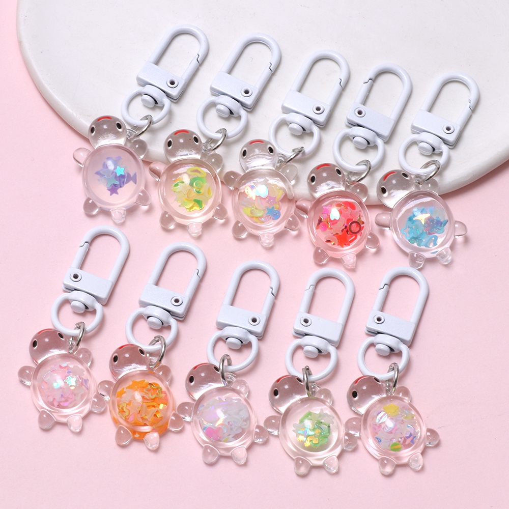 1 ชิ้นที่มีสีสันส่องสว่างเต่าพวงกุญแจแยกแหวน Keyfob สําหรับของขวัญเด็ก Charm สําหรับอุปกรณ์เสริมตกแต่ง
