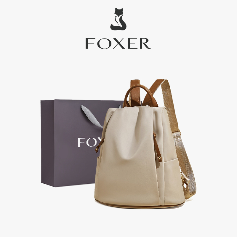 FOXER กระเป๋าเป้สะพายหลังผู้หญิง กระเป๋าเป้สะพายหลังผ้าใบ กระเป๋าแฟชั่นนักเรียน กระเป๋าเดินทาง