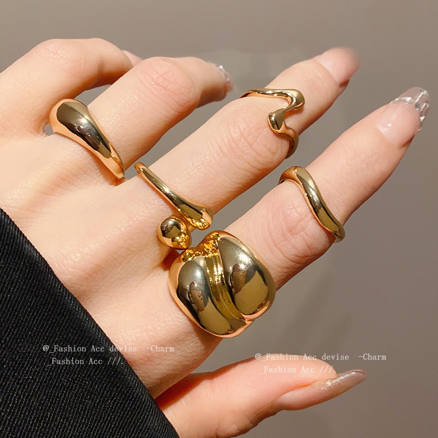 แหวนเปิดรูปถั่วหลายชั้นรูปไข่เรียบง่ายทันสมัยและอเนกประสงค์ เป็นอุปกรณ์เสริมที่ไม่ซ้ําใครระดับไฮเอนด์และสง่างาม