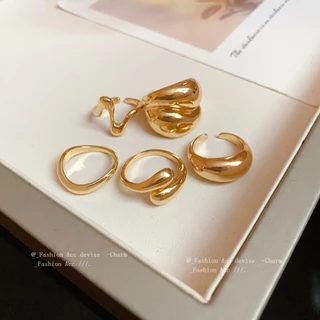 แหวนเปิดรูปถั่วหลายชั้นรูปไข่เรียบง่ายทันสมัยและอเนกประสงค์ เป็นอุปกรณ์เสริมที่ไม่ซ้ําใครระดับไฮเอนด์และสง่างาม