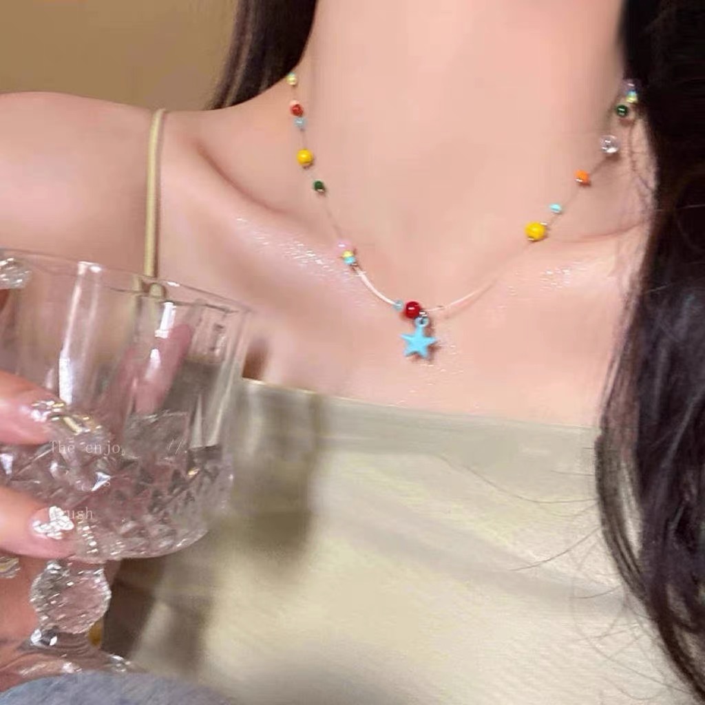 แฟชั่น เกาหลีที่มีสีสันดาวลูกปัดสร้อยคอหญิง อิน ดีนักเรียนของขวัญวันเกิด