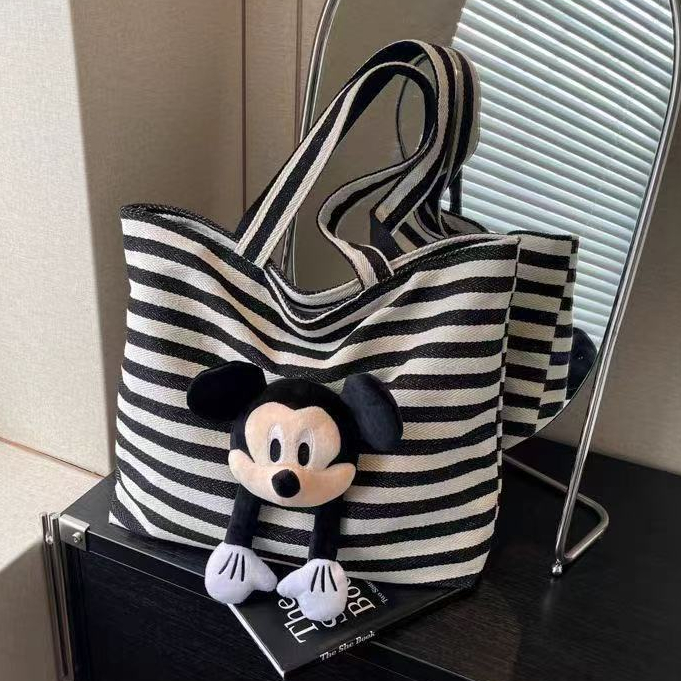 กระเป๋าผ้าใบลายทางผู้หญิงสไตล์เกาหลีแฟชั่นการ์ตูนมิกกี้กระเป๋าสะพายข้างเดียวน่ารัก