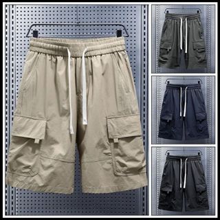 กางเกงขาสั้นฤดูร้อนใหม่มีกระเป๋าข้างและเอวยางยืดไซส์ใหญ่ กาง…