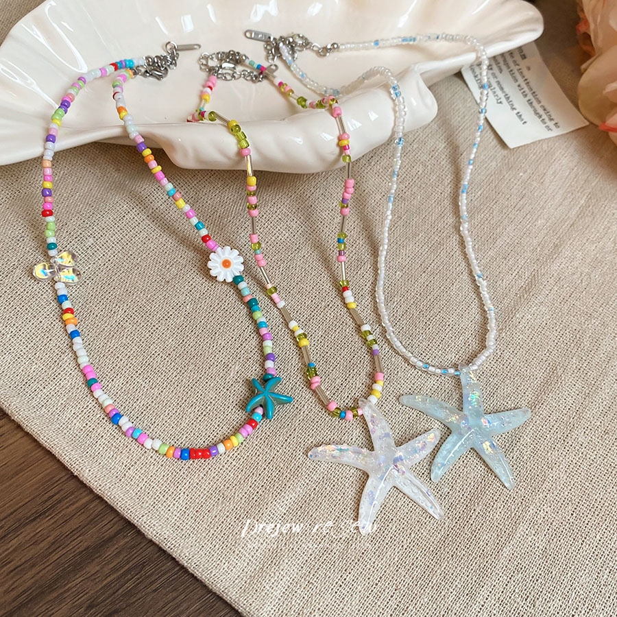 เดรช สร้อยคอดอกไม้ปลาดาวสีสันสดใสสดและหวานโซ่กระดูกไหปลาร้าซ้อนสไตล์วันหยุดชายทะเลสร้อยคอตกแต่ง