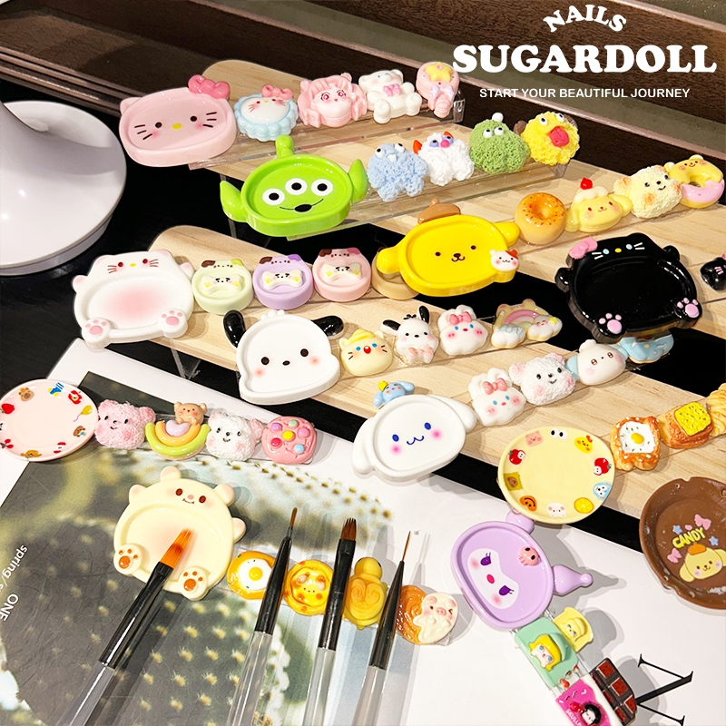 พร้องส่งในBangkok ขาตั้งปากกาเล็บ อุปกรณ์ทำเล็บในตัวเดียว 14 แบบ  ลายการ์ตูนซานริโอ  มัลติฟังก์ชั่น คุโรมิ น่ารักสุดๆ วางปากกา จานสี