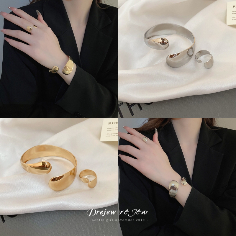 ยุโรปและอเมริกาโลหะมันวาวรูปไข่เปิดสร้อยข้อมือส่วนบุคคลสร้อยข้อมืออเนกประสงค์แสงหรูหราเครื่องประดับมือระดับไฮเอนด์