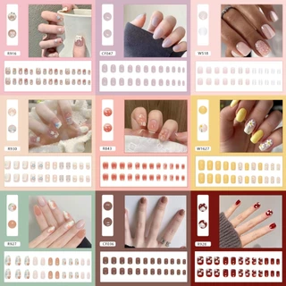 นํากลับมาใช้ใหม่ได้ 24 ชิ้นน่ารักการ์ตูนกดบนเคล็ดลับปลอมประดิษฐ์ Stick-on เล็บเคล็ดลับ Art