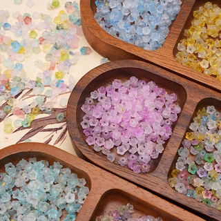 ลูกปัดดอกไม้เล็กไล่สีทองวาว 6x3mm 100 ชิ้น สำหรับ DIY งานเครื่องประดับทำสร้อยดอกไม้ สร้อยข้อมือ และสร้อยคอ