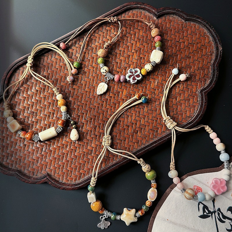 ใหม่จีนดอกไม้ใบจี้สร้อยข้อมือลูกปัดเซรามิกผู้หญิงสไตล์ชาติพันธุ์ดาวทอสร้อยข้อมือเซรามิก