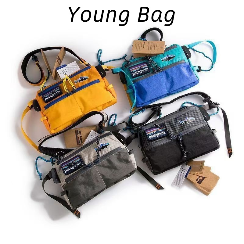 【จัดส่งที่รวดเร็ว🔥】Patagonia กระเป๋าสะพายข้างแฟชั่น ใหม่ กระเป๋าสะพายไหล่ สะพายข้าง ลายปลาบิน