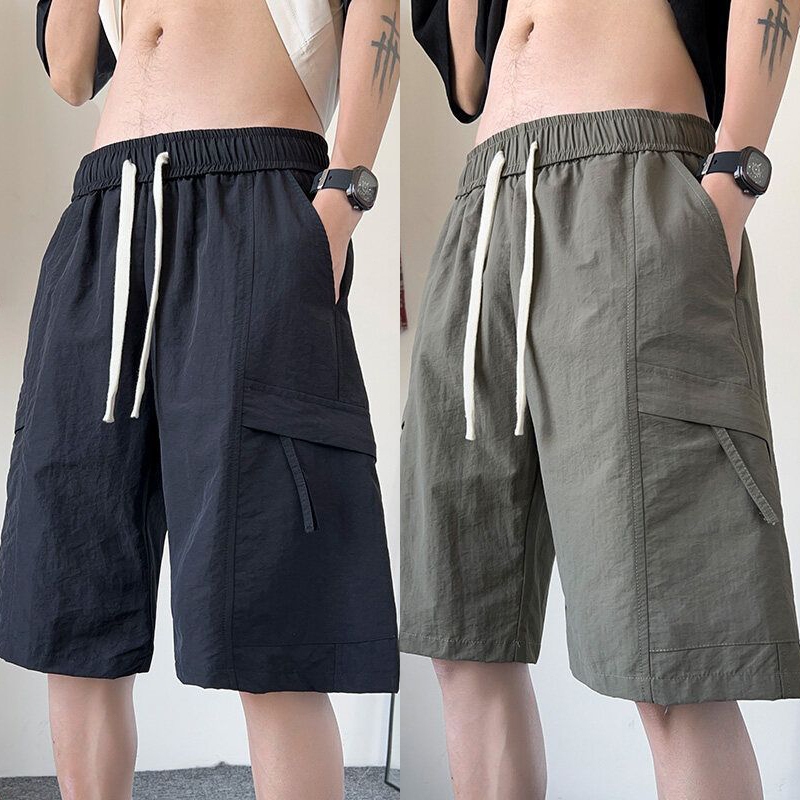 กางเกงขาสั้นผู้ชาย ลำลองสไตล์สปอร์ต เอวยางยืด M-5XL เรียบง่ายและอเนกประสงค์ สวมใ