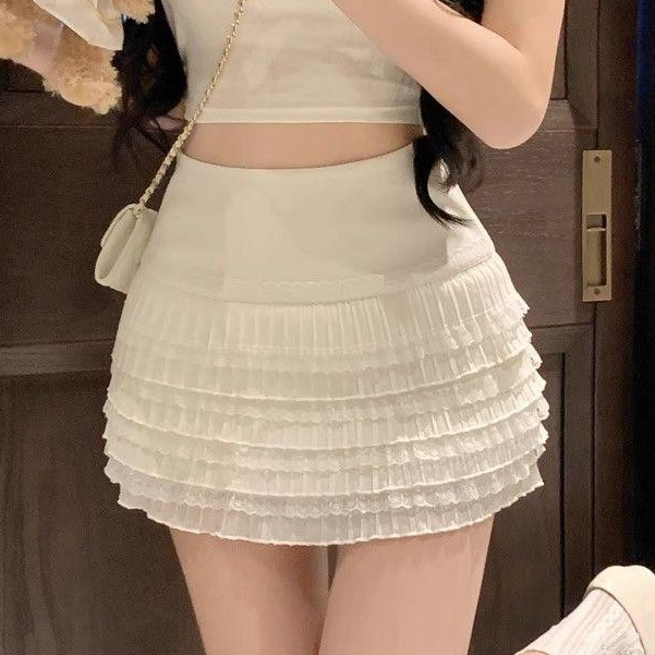 กระโปรงสั้นสไตล์เกาหลี สีขาว ลูกไม้ มาพร้อมเอวสูงและ Zip mini golf tennis skirt for women หวานหรู สำหรับสาวผอม ฤดูร้อน ใหม่