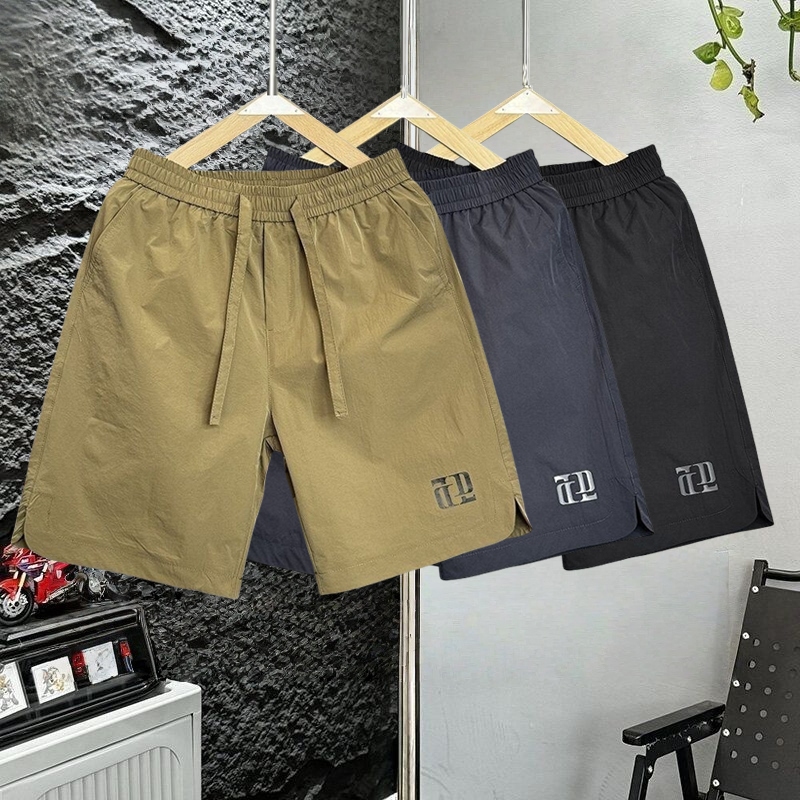 กางเกงขาสั้นผู้ชาย สำหรับทำงานทรงเรียบง่าย ใส่ลำลองอเนกประสงค์ สีพื้นเอวยางยืด บ