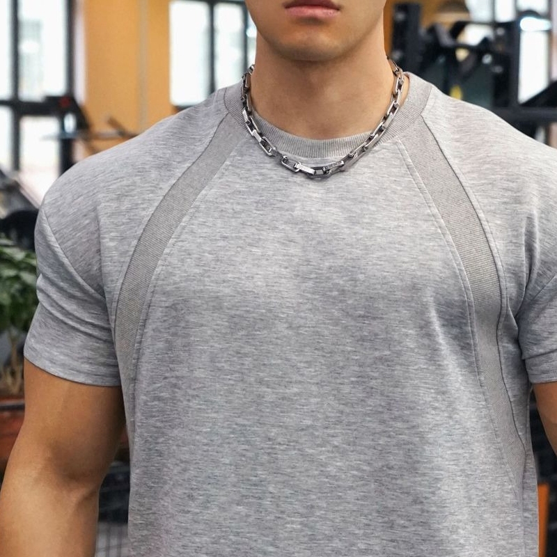 เสื้อกีฬาลำลองผู้ชายใหม่ แขนสั้น เย็บละเอียด กันยีบและริ้วรอย สวมใส่สบาย - รูปที่ 2