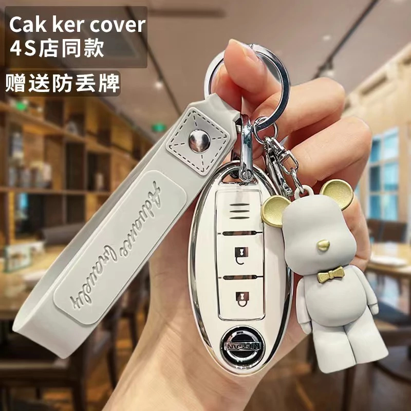 Nissan พวงกุญแจรถยนต์ หนังโลหะ กันน้ํา อุปกรณ์เสริม สําหรับ Nissan ALMERA LEAF 370Z GTR LIVINA KICKS