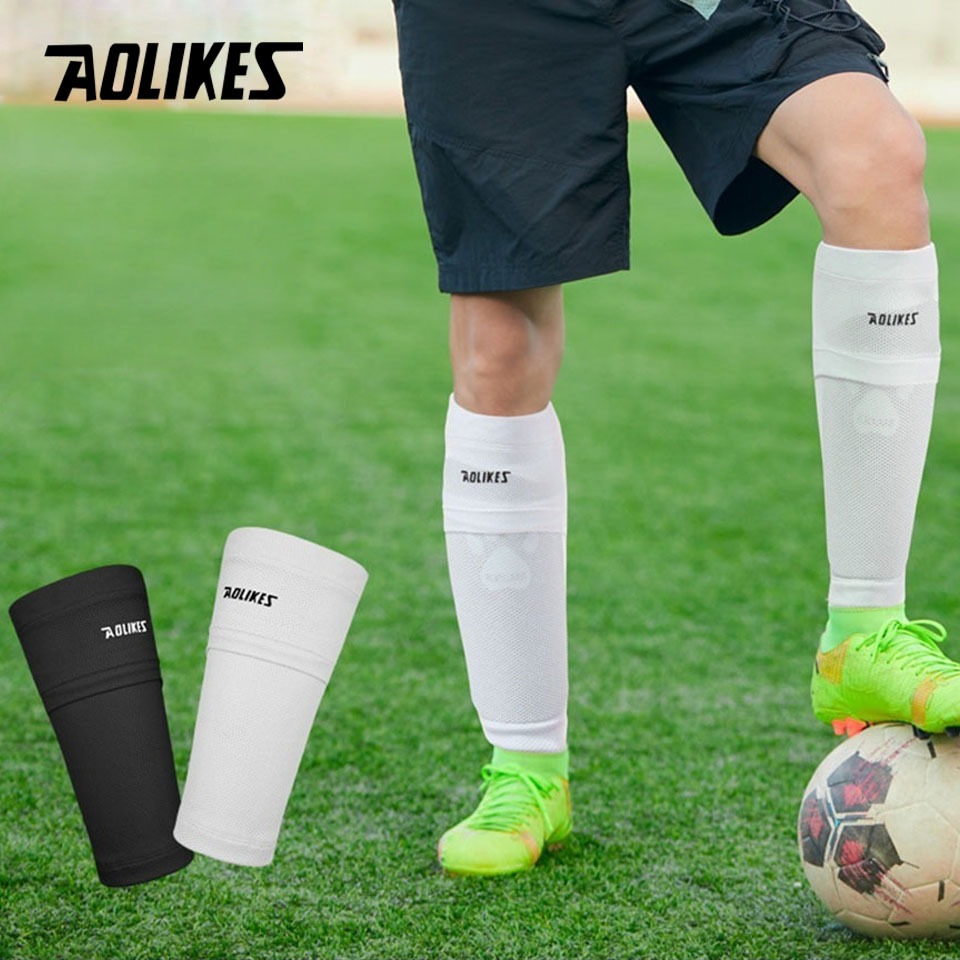 AOLIKES คู่ฟุตบอล Shin Guard ดีไซน์ป้องกันแรงกระแทกด้วยวัสดุไนลอน มาพร้อมกระเป๋าสำหรับการฝึกฝน