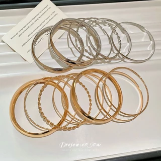 สร้อยข้อมือโลหะลวดลายเงางาม สไตล์เซ็ต 8 ชิ้น สำหรับสวมใส่งานหลากหลายโอกาส ดีไซน์เฉพาะตัว