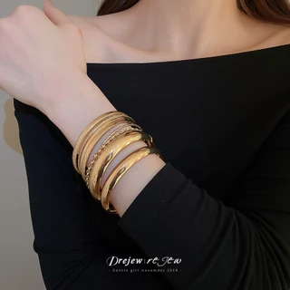 สร้อยข้อมือโลหะลวดลายเงางาม สไตล์เซ็ต 8 ชิ้น สำหรับสวมใส่งานหลากหลายโอกาส ดีไซน์เฉพาะตัว